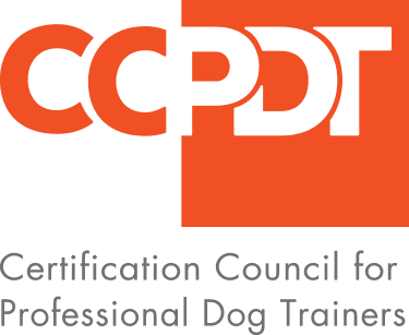 A black and red logo for the certification council for professional dog trainers.